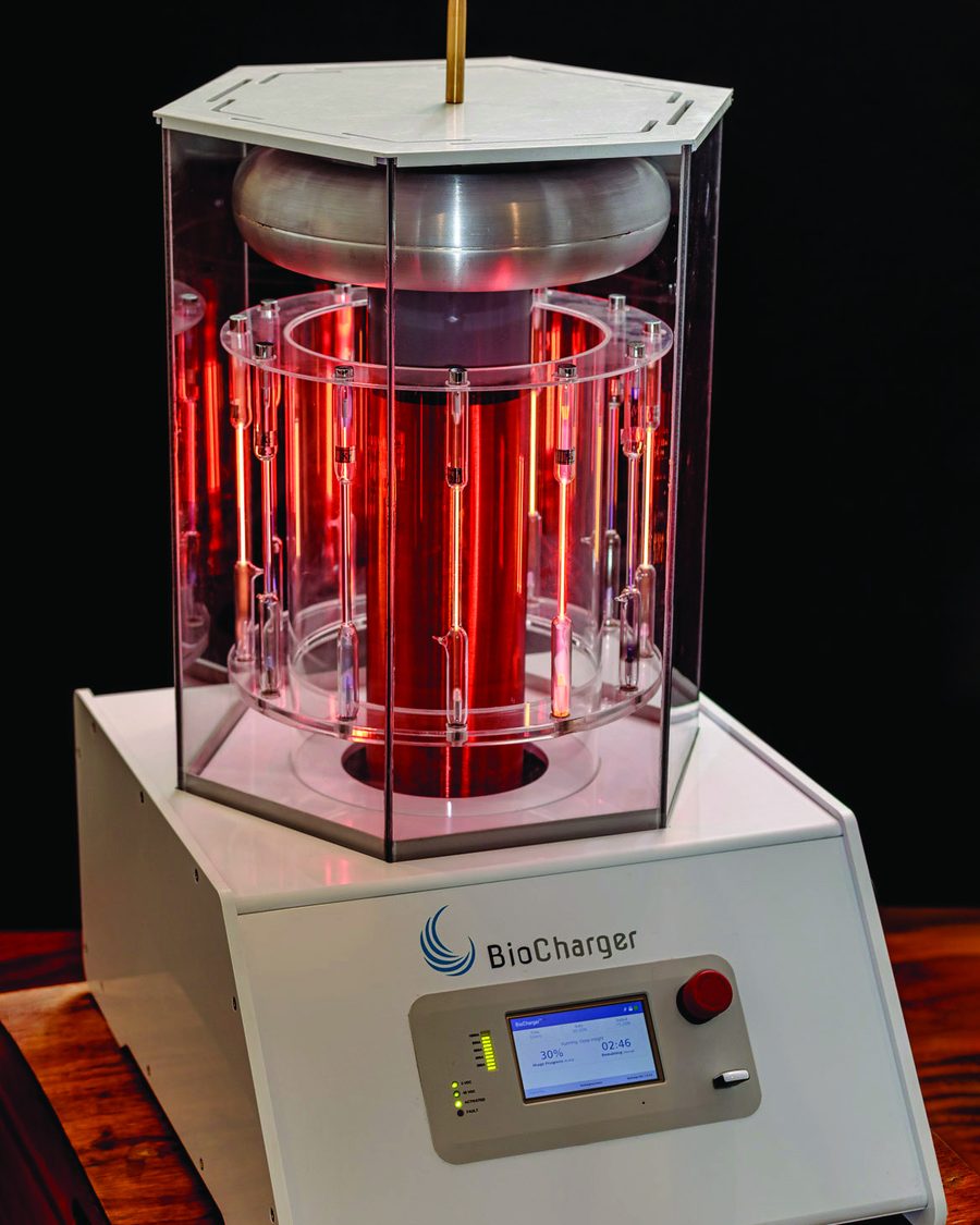 The BioCharger with its glowing red plasma tubes