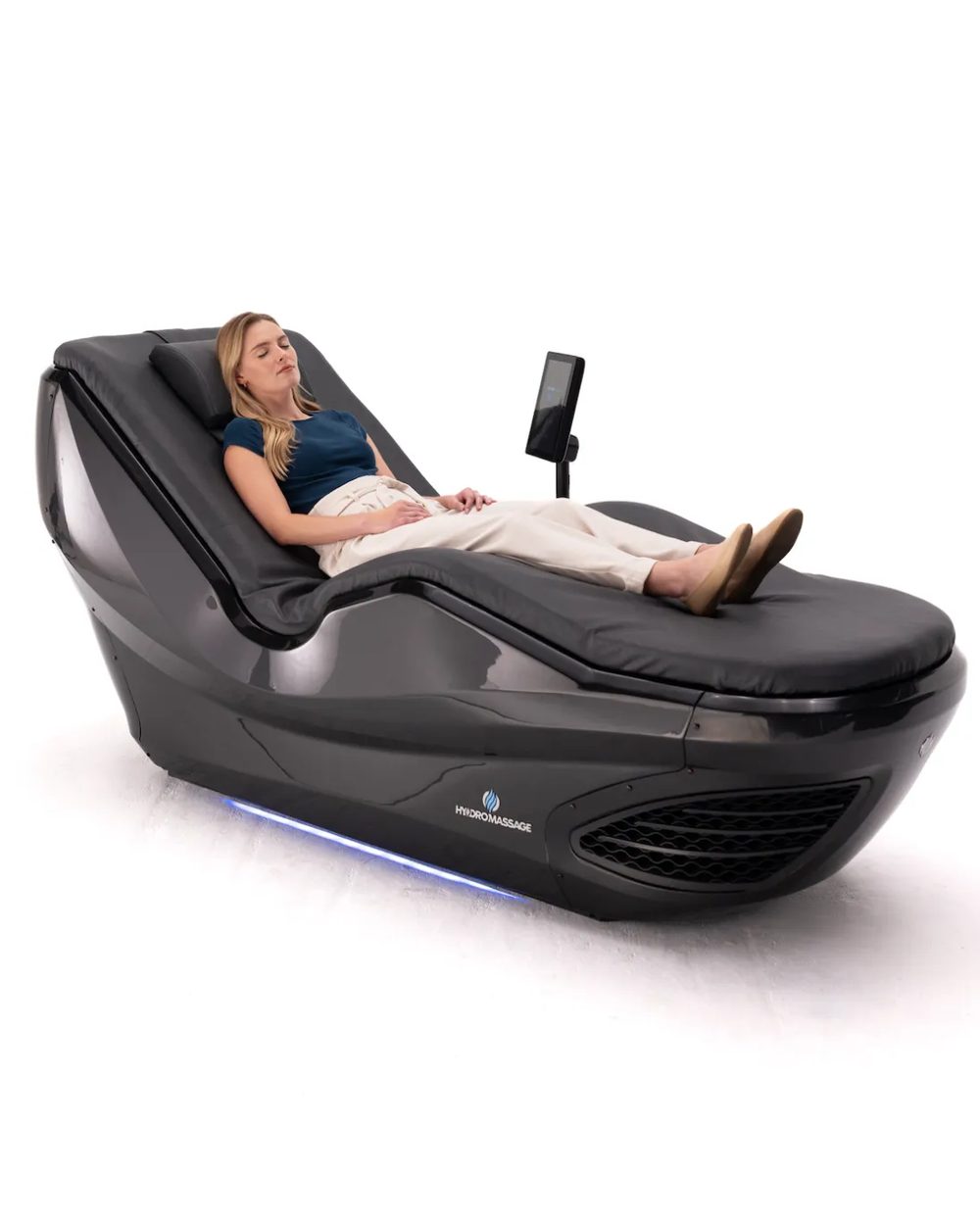 A woman relaxing on a HydroMassage 440 G3 Lounge