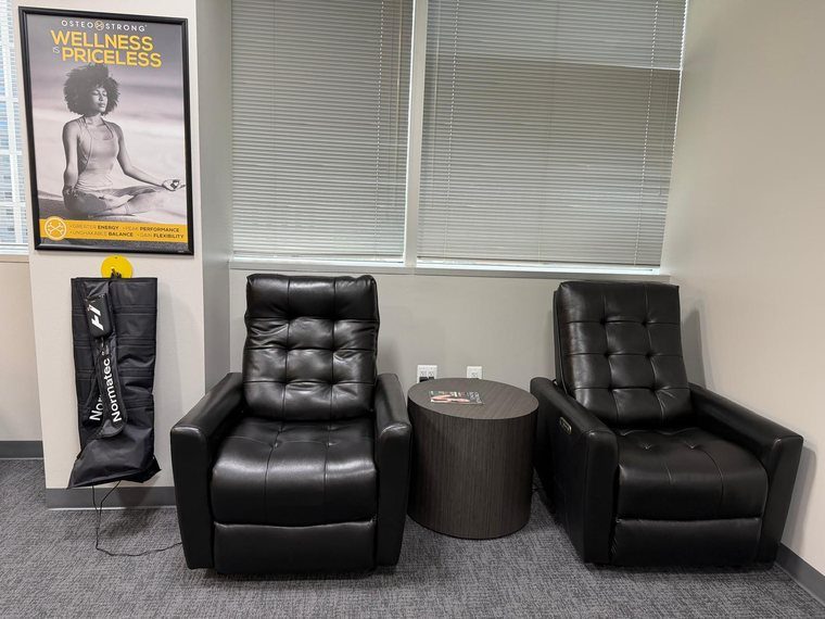 Compression boot recliners at OsteoStrong Tysons